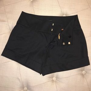 Mid rise dress shorts. New